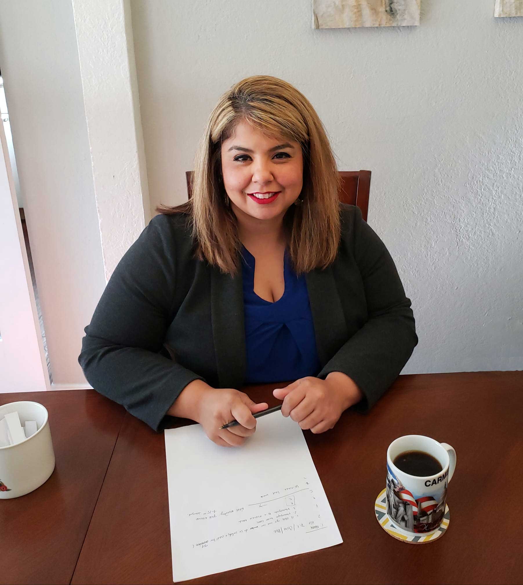 Carmen at the conference table